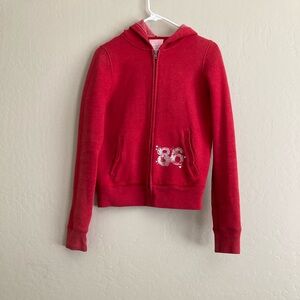 Victoria’s secret SweatShirt.